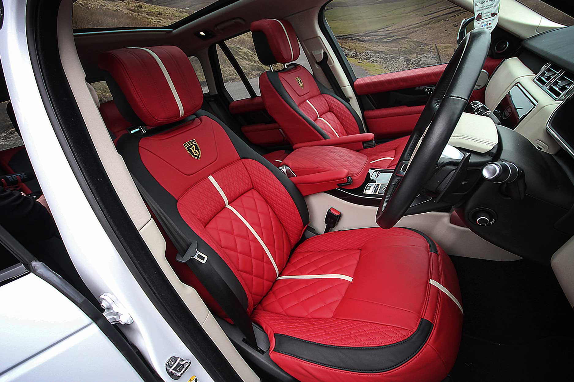 interior_gallery_bison_executive_405_red_cream_driver_side