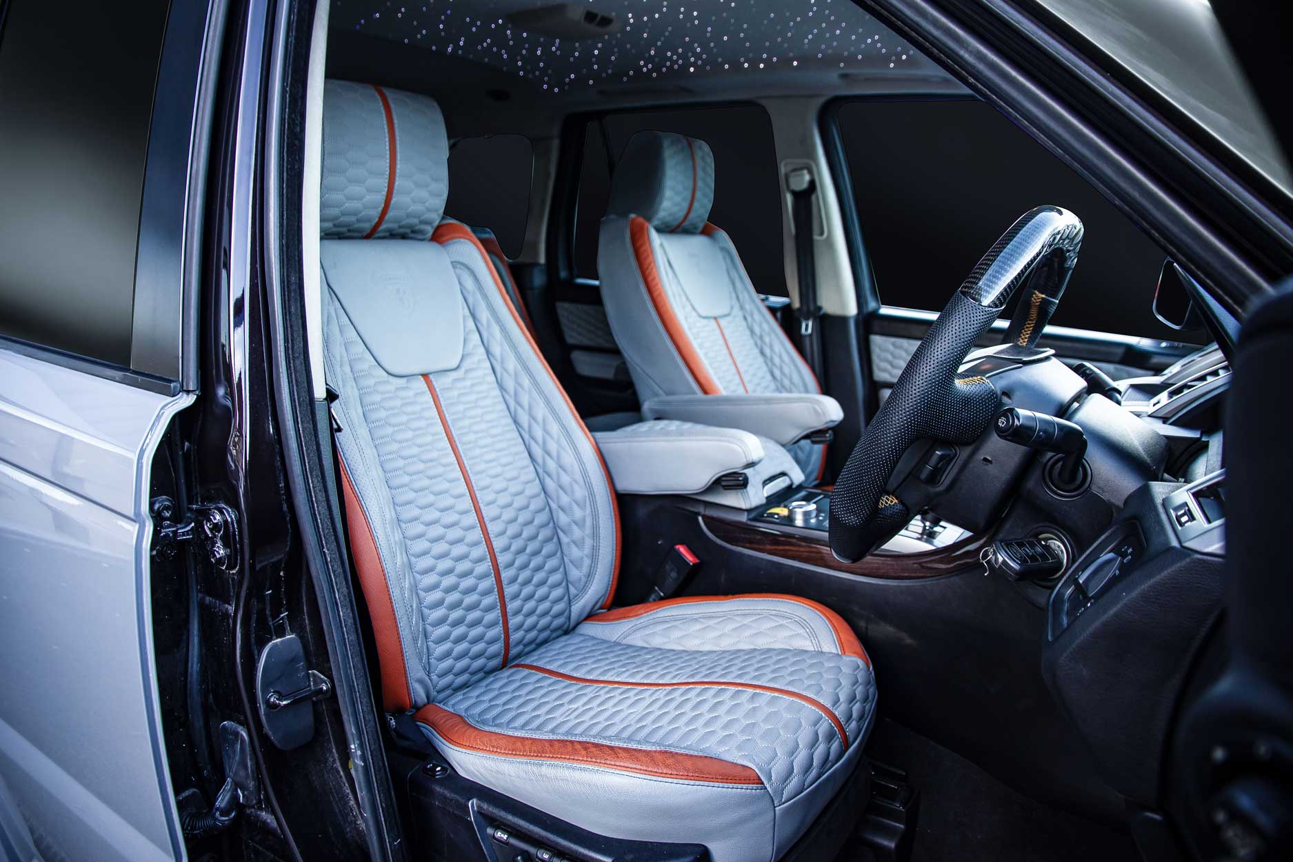 interior_gallery_classic_sport_320_grey_orange_driver_side_front