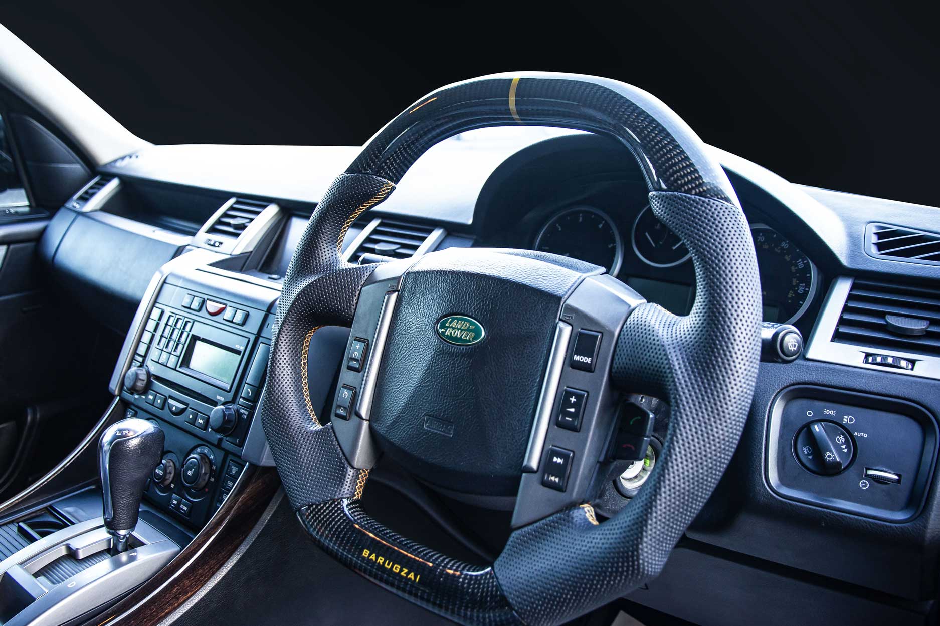 interior_gallery_classic_sport_320_grey_orange_steering_wheelt